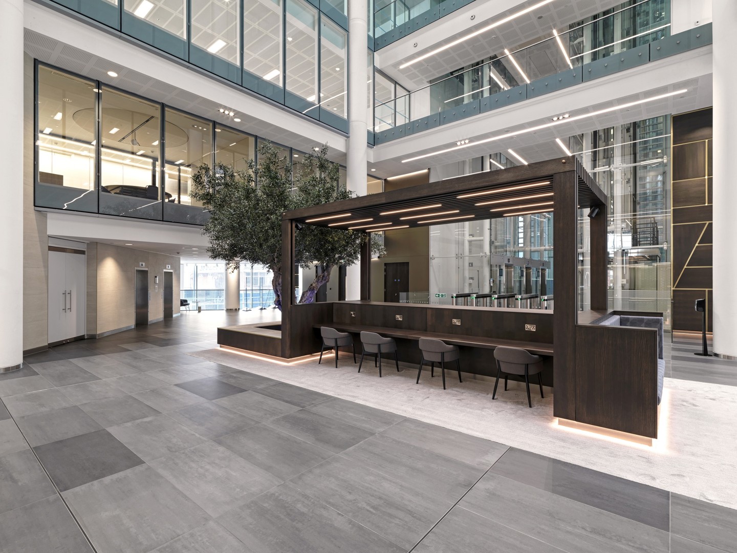 An artificial bespoke olive tree situated inside Three Snow Hill, Birmingham